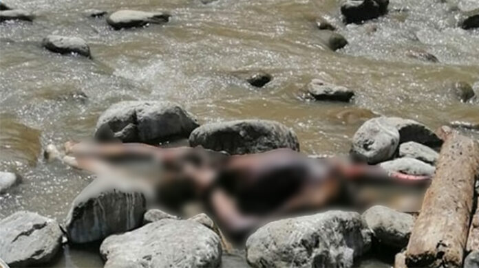Pobladores hallan cuerpo de mujer quemada en las orillas del río Tambopata